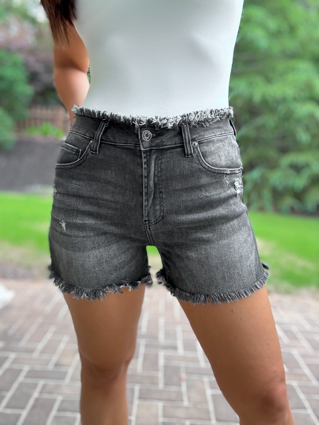Flawlessly Frayed Black Jean Shorts