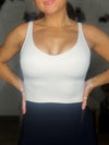 Holding Up Padded Workout Tank