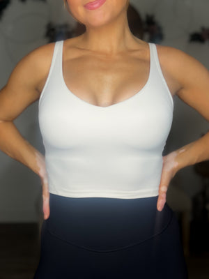 Holding Up Padded Workout Tank