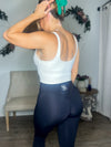 Holding Up Padded Workout Tank